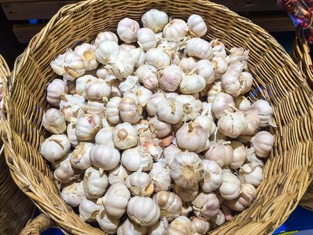 Lots of garlic in a basket.の写真素材