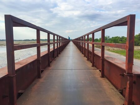 Steel bridge used for the crossing the river.の写真素材