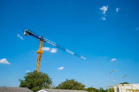 Crane is used in the construction of  buildings.の写真素材
