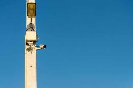 CCTV cameras are installed on electrical poles. safty,の写真素材