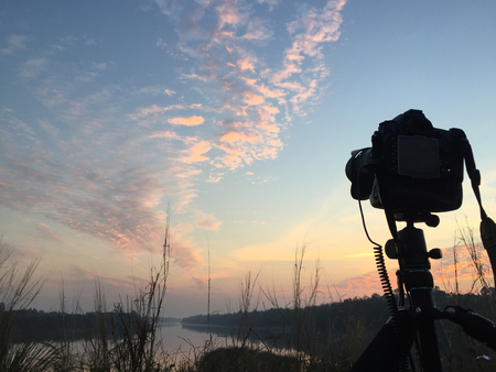 Camera and sunrise.の写真素材