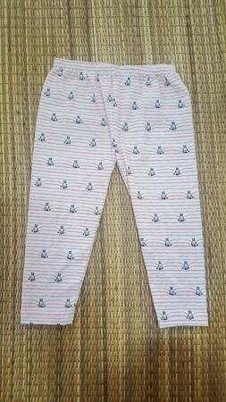 Baby Leggings Pants on white background, clothes for children.の写真素材