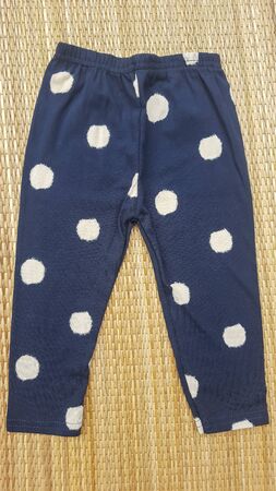 Baby Leggings Pants on white background, clothes for children.の写真素材