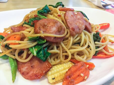 Delicious spaghetti Sausage in restaurant of Thailandの写真素材