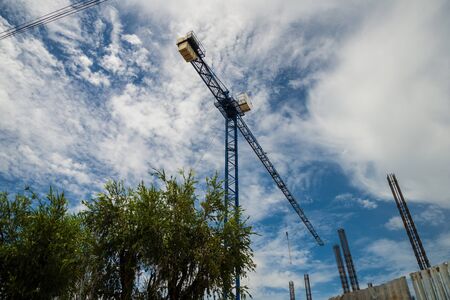 Crane is used in the construction of  buildings.の写真素材