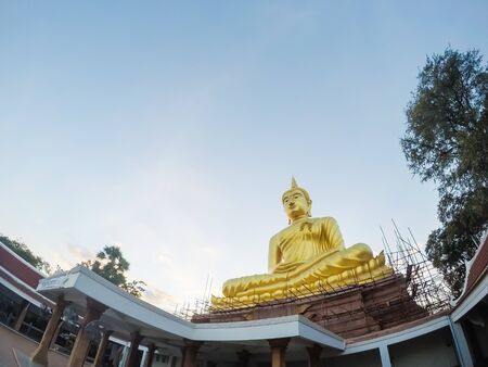 Large buddha statue in the temple of Thailand.の写真素材