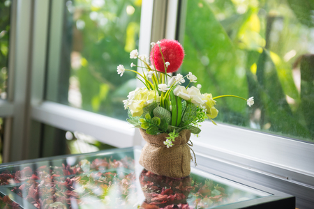 Flowers used to decorate on a table, sensitive focus.の写真素材