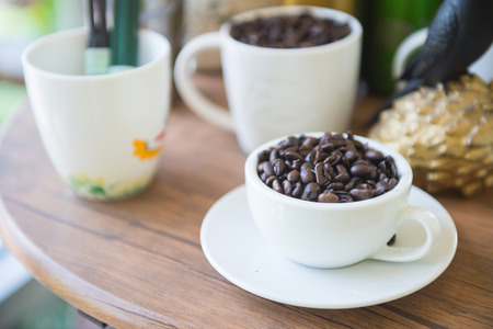 Coffee beans in a cup for decoration.の写真素材