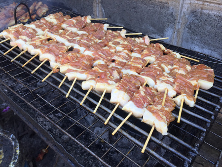 Barbecue pork Toast grill or Toast pork with Thai garnish nutrition preparation for cooking. Thai food, Street food.の写真素材