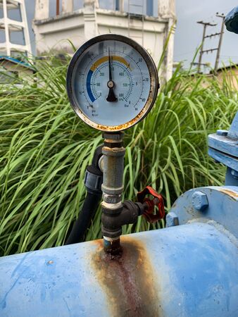 Pressure Guage in Water Processing Plant. Pressure Guage on water pipe.