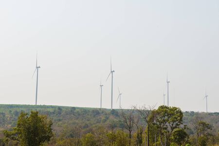 Windmills for electric power production on mountainの写真素材
