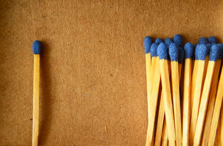 wooden matches on a box, social distance example wit matchesの写真素材
