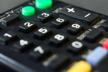 close up of HOME button on remote control, play button, close up of play and pause button, close up of buttons of remote control, electronic device, speakerの写真素材