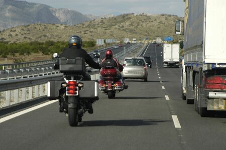 MOTORCYCLES BY A-92 motorway between Granada and Bazaの写真素材
