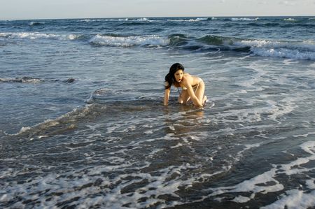YOUNG WOMEN IN THE BEACH OF CAPE GATAの写真素材