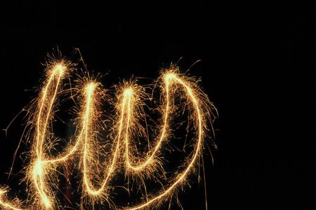 END written word in the air with a flare, in Spanishの写真素材