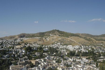 View of the city of Grenada from Torre de la Vela to the Alhambra in Granada の写真素材