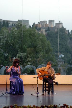 music show with guitarist josï¿½ manuel cano and singer carmen garcï¿½a segura, in the events in honor of san cayetano de thienne, managers of the college of granada, jaen and almeria, in the grounds of the chumbera of granada, 6 / 07 / 2007のeditorial素材