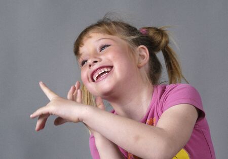 Blond girl in photo studioの写真素材