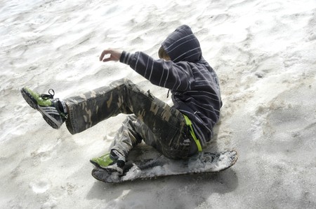 Children playing in the snowの写真素材