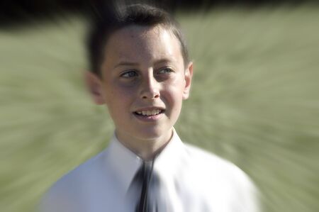 Child Costume Dress First Communion in the fieldの写真素材