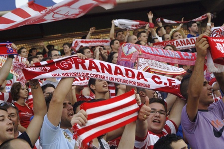 celebracin in grenada after the final for promotion to first division, apoyndoles with fans at the soccer field of crmenes 19/06/2011のeditorial素材