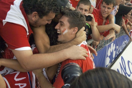 celebracin in grenada after the final for promotion to first division, apoyndoles with fans at the soccer field of crmenes 19/06/2011のeditorial素材