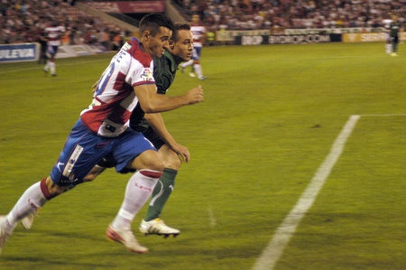 football game between the granada cf and real betis 27/08/2011のeditorial素材
