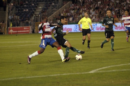 football game between the granada cf and real betis 27/08/2011のeditorial素材