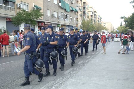 atmosphere prior to the football game between the granada cf and deployment of police betis 27/08/2011のeditorial素材