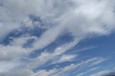 blue sky with clouds over the city of granadaの写真素材