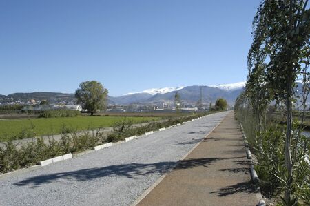 banks of the genil river, sierra nevada in the background.の写真素材