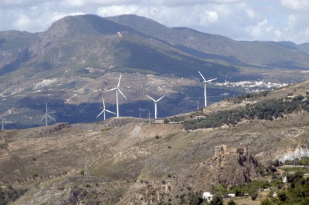 wind turbines in the town of lajaron, in alpujarra de granada. production of wind energy, renewable energyの写真素材