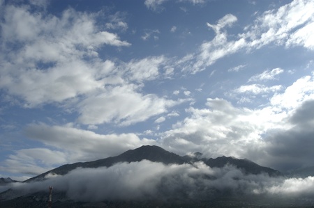 view lecrin valley to the sierra nevada in the background with low cloudsの写真素材