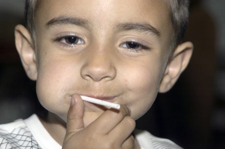 child eating candy