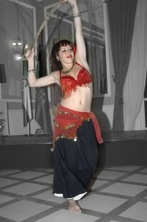 young woman dancing an oriental dance. 11-11-2011のeditorial素材