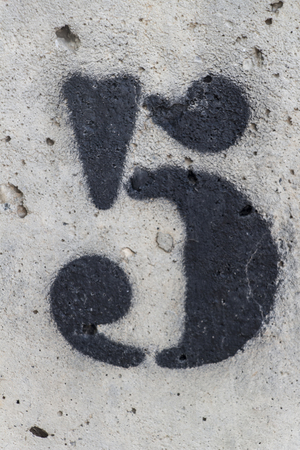 number five painted stencil on concrete wall, number five, number 5の写真素材