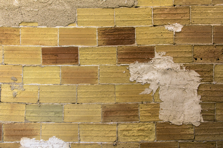 old brick wall background, old brick wall, mud brick wall, worn brickの写真素材