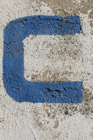 painted letter on vintage wall, letter cの写真素材