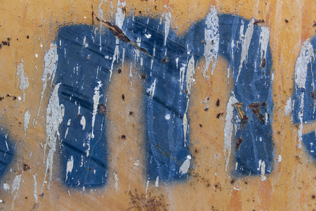 blue stencil painted on rusty background, blue stencil painted on rusty background, letter mの写真素材