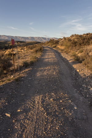 old dirt road in the desert, lonelinessの写真素材