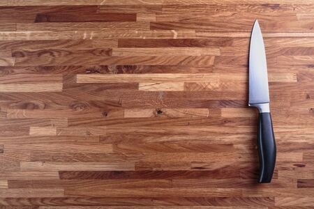knife chef on a cutting boardの写真素材