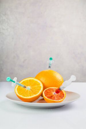 fresh juicy fruits on a plateの写真素材