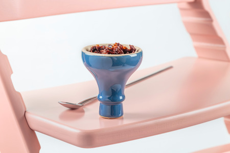 shisha with Apple flavor in glossy blue bowl, cooked for Smoking