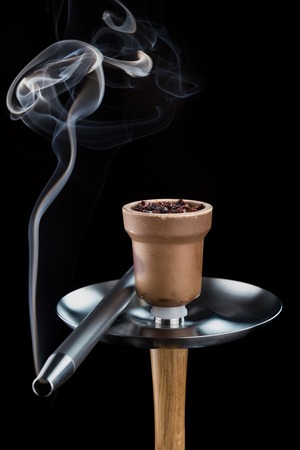 Modern hookah isolated on black background