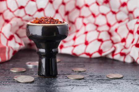 shisha with Apple flavor in a glossy black bowl, cooked for Smoking.の写真素材