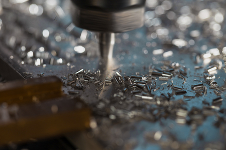 Milling of aluminum plate on a programmable machine. Milling process.の写真素材