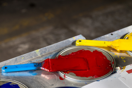 Closeup spatulas in color printing ink. CMYKの写真素材