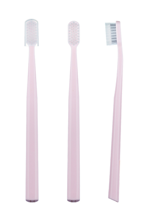 Three different angles of the tooth-brush, isolated on white backgroundの写真素材