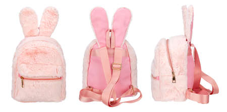 Set of three angles of a backpack made of pink fur with decorative rabbit ears, with a zipper, with an external patch pocket isolated on a white background.の写真素材
